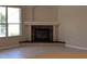 Bright living room featuring a stone fireplace at 19116 Nature Palm Ln, Tampa, FL 33647