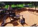 Outdoor playground features a variety of play structures, offering a fun and engaging space for children to explore and play at 19116 Nature Palm Ln, Tampa, FL 33647