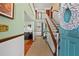 Bright and airy foyer with staircase and views into the living area at 19254 Blount Rd, Lutz, FL 33558