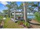 Outdoor gazebo with furniture and a scenic lake view at 19254 Blount Rd, Lutz, FL 33558
