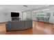Spacious living room with lake views, hardwood floors, and an open floor plan at 19254 Blount Rd, Lutz, FL 33558