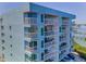 Close-up view of condo balconies, highlighting the building's architecture and outdoor living spaces at 19925 Gulf Blvd # 503, Indian Shores, FL 33785