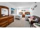 Bright bedroom featuring two twin beds, dresser, and beach-themed decor at 19925 Gulf Blvd # 503, Indian Shores, FL 33785