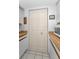Bright kitchen features pantry and tile floors at 19925 Gulf Blvd # 503, Indian Shores, FL 33785