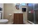 Bathroom featuring a shower with glass doors, vanity, neutral walls, and tiled flooring at 2505 Minnehaha, Tampa, FL 33614