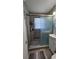 Nicely updated bathroom with tiled shower, glass door, and neutral colors at 2505 Minnehaha, Tampa, FL 33614