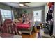 Bedroom featuring pink and white decor, natural light, and wood-look flooring at 2505 Minnehaha, Tampa, FL 33614