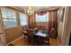 Charming dining room featuring wood table, seating for six, and a decorative chandelier at 2505 Minnehaha, Tampa, FL 33614
