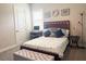 Charming bedroom with a desk and nautical-themed decor at 28857 Picana Ln, Wesley Chapel, FL 33543