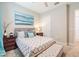 Comfortable bedroom with a window and stylish furnishings at 28857 Picana Ln, Wesley Chapel, FL 33543