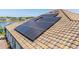 Solar panels on the roof to provide energy efficiency for this lovely home at 28857 Picana Ln, Wesley Chapel, FL 33543