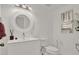 Clean, bright bathroom with white fixtures and modern decor at 2947 Cedar Trce, Tarpon Springs, FL 34688