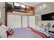 Bedroom with loft, showing functional space and closet storage at 2947 Cedar Trce, Tarpon Springs, FL 34688