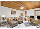 This office features a wood ceiling, nice furniture, and good lighting to work at 2947 Cedar Trce, Tarpon Springs, FL 34688