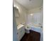 Bathroom with a shower-tub combination, modern vanity, and sleek fixtures at 321 David Ave, Clearwater, FL 33759