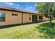 The backyard includes an enclosed patio and lawn at 329 Seneca Falls Dr, Apollo Beach, FL 33572