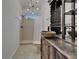 Elegantly designed bathroom with a unique vessel sink, walk-in shower, and modern fixtures at 329 Seneca Falls Dr, Apollo Beach, FL 33572
