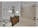 Charming bathroom with vintage sink and vanity paired with a modern shower and tub at 329 Seneca Falls Dr, Apollo Beach, FL 33572