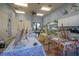 Bright common area with ceiling fan, large tables and storage cabinets at 329 Seneca Falls Dr, Apollo Beach, FL 33572