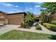 Well-maintained single-story home with a two-car garage and landscaped front yard at 329 Seneca Falls Dr, Apollo Beach, FL 33572