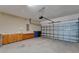 An attached garage features built-in cabinets and an automated door at 329 Seneca Falls Dr, Apollo Beach, FL 33572