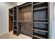 Spacious walk-in closet equipped with multiple shelves and clothes hanging rods at 329 Seneca Falls Dr, Apollo Beach, FL 33572