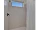 Bright shower with a handheld shower head and a window allowing natural light at 329 Seneca Falls Dr, Apollo Beach, FL 33572
