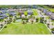 A community park featuring playground, basketball court, walking paths, and plenty of green space at 33228 Kateland Dr, Wesley Chapel, FL 33545