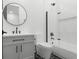 Modern bathroom featuring an updated vanity, toilet, and a combined shower and bathtub at 33228 Kateland Dr, Wesley Chapel, FL 33545