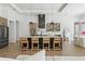 Modern kitchen island featuring pendant lighting and seating for four at 33228 Kateland Dr, Wesley Chapel, FL 33545