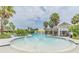Resort-style pool featuring a fun splash area with fountains, perfect for Gathering enjoyment at 33228 Kateland Dr, Wesley Chapel, FL 33545