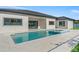 Backyard view of in-ground swimming pool and attached spa at 33228 Kateland Dr, Wesley Chapel, FL 33545