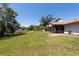 Enjoy the large private backyard with direct access to the lake at 3330 Foxridge Cir, Tampa, FL 33618