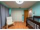 This Bedroom features a crib and a closet, offering ample storage at 3330 Foxridge Cir, Tampa, FL 33618