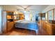 Cozy bedroom featuring built-in storage, carpet flooring, and a ceiling fan at 3330 Foxridge Cir, Tampa, FL 33618
