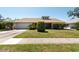 Charming home with a well-maintained front yard and a cozy exterior at 3330 Foxridge Cir, Tampa, FL 33618