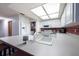 Spacious kitchen features white cabinets, a breakfast bar, and stainless steel appliances at 3330 Foxridge Cir, Tampa, FL 33618