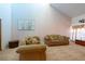 Cozy living room showcasing couches and neutral color palette at 3330 Foxridge Cir, Tampa, FL 33618