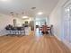 Open-concept kitchen with a breakfast bar, stainless steel appliances, and ample counter space at 4505 Alligator Dr, New Port Richey, FL 34653