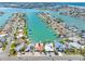 Stunning aerial view of waterfront homes, showcasing easy canal access and serene coastal living at 455 115Th Ave, Treasure Island, FL 33706
