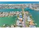 Waterfront property with a pool and boat dock, located on a canal near the beach at 455 115Th Ave, Treasure Island, FL 33706