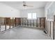 Bedroom with cinderblock walls and a view of the water at 455 115Th Ave, Treasure Island, FL 33706