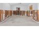 Spacious living room featuring open walls, concrete floors, and bright natural light at 455 115Th Ave, Treasure Island, FL 33706