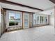 Open-concept living space with waterfront view through large windows at 455 115Th Ave, Treasure Island, FL 33706