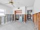 Living Room featuring open closet, concrete floors, and bright natural light at 455 115Th Ave, Treasure Island, FL 33706