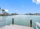 Scenic waterfront view from a private dock, perfect for boating and relaxation at 455 115Th Ave, Treasure Island, FL 33706