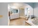 Bathroom with a skylight, soaking tub, walk-in shower, and double sink vanity at 5005 Puritan Rd, Tampa, FL 33617
