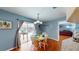 Bright dining room with a view of the pool and access to the living room at 5005 Puritan Rd, Tampa, FL 33617