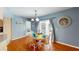 Charming dining room bathed in natural light with stylish decor at 5005 Puritan Rd, Tampa, FL 33617