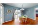 Inviting dining area with a view of the backyard pool, perfect for Gathering meals at 5005 Puritan Rd, Tampa, FL 33617